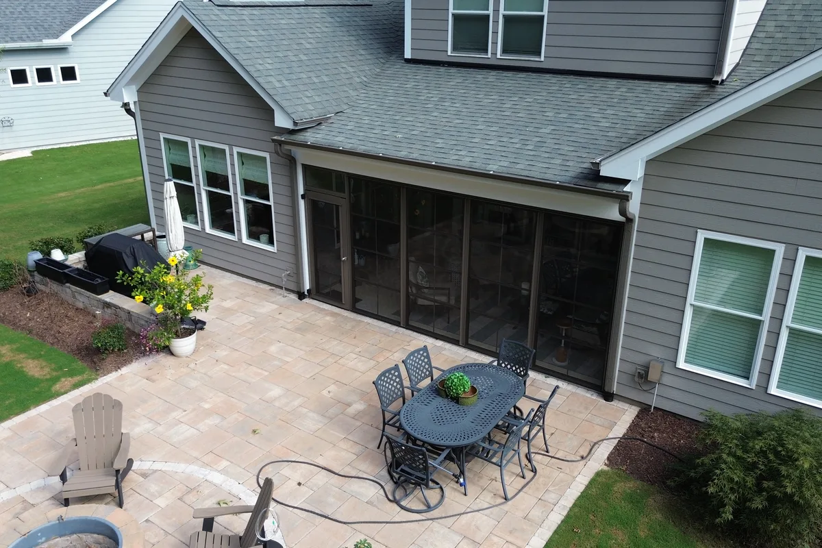 Completed 3-season porch enclosure vinyl-film detail in Belmont