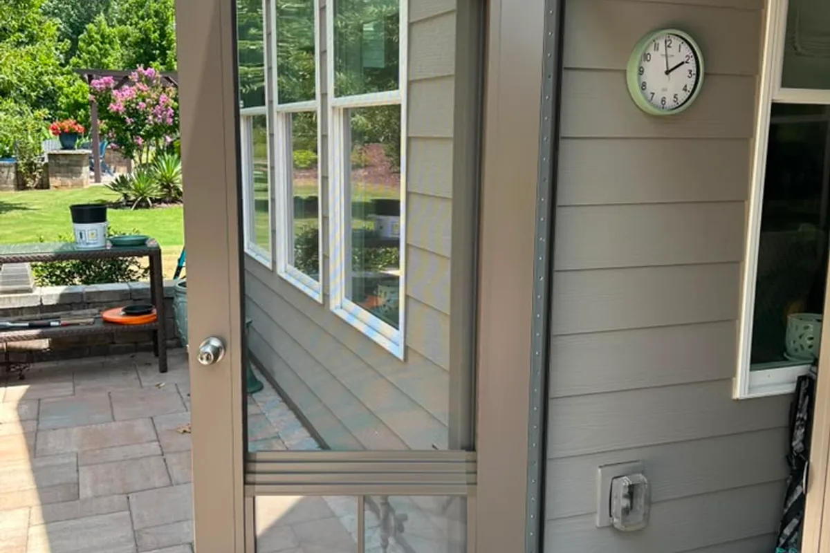 Vinyl enclosure contractor detail work on 3-season room in Belmont NC