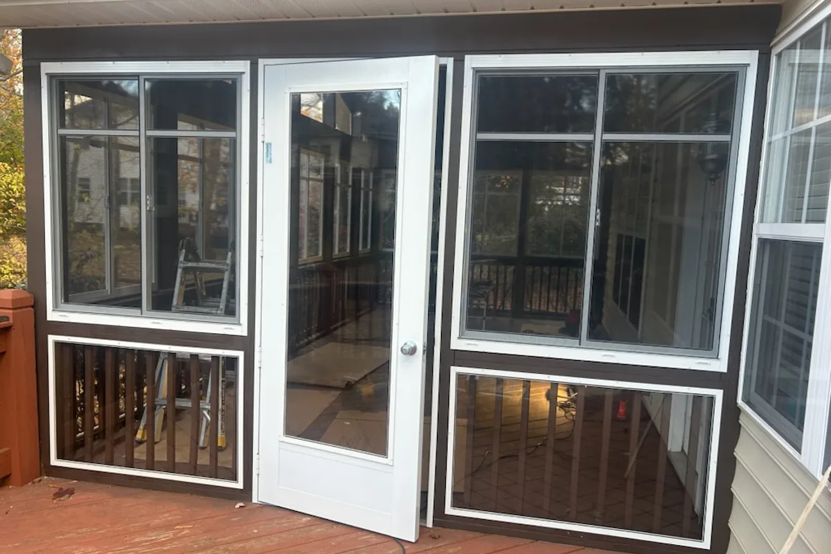 Vinyl film sunroom enclosure detail showing completed installation in Charlotte