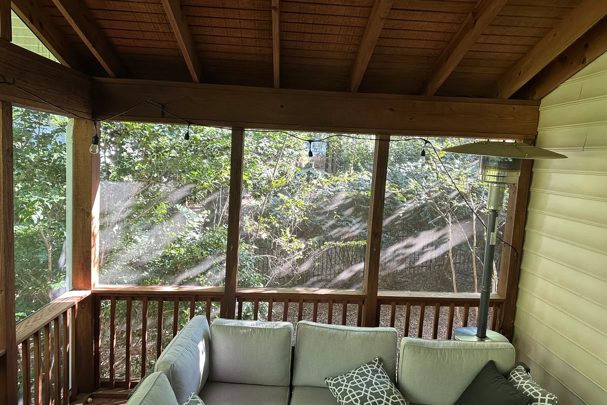 Existing porch detail prior to vinyl film enclosure project in Charlotte NC