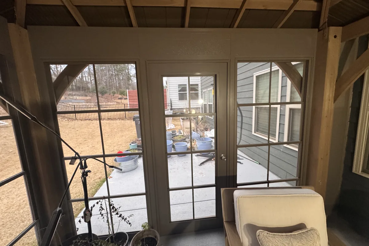Vinyl film enclosure frame and attachment detail Charlotte porch contractor
