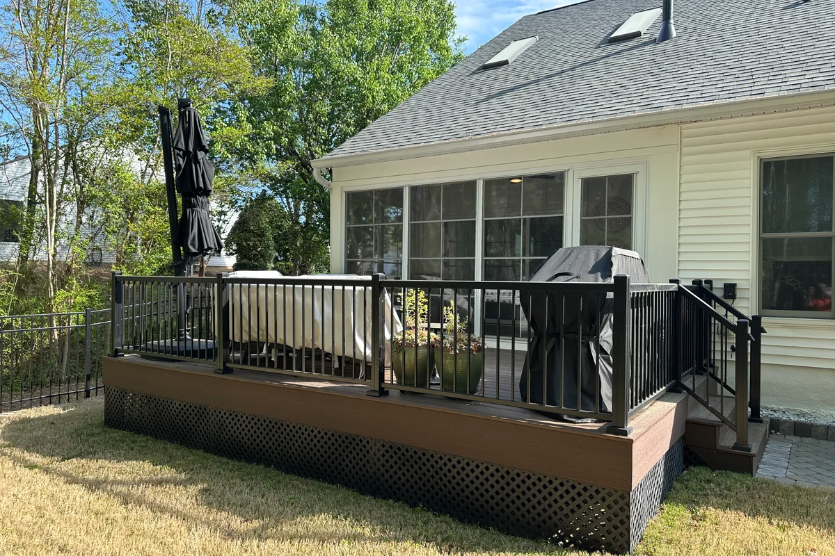 Finished 3-season vinyl-film deck enclosure exterior in Elrose, Charlotte NC