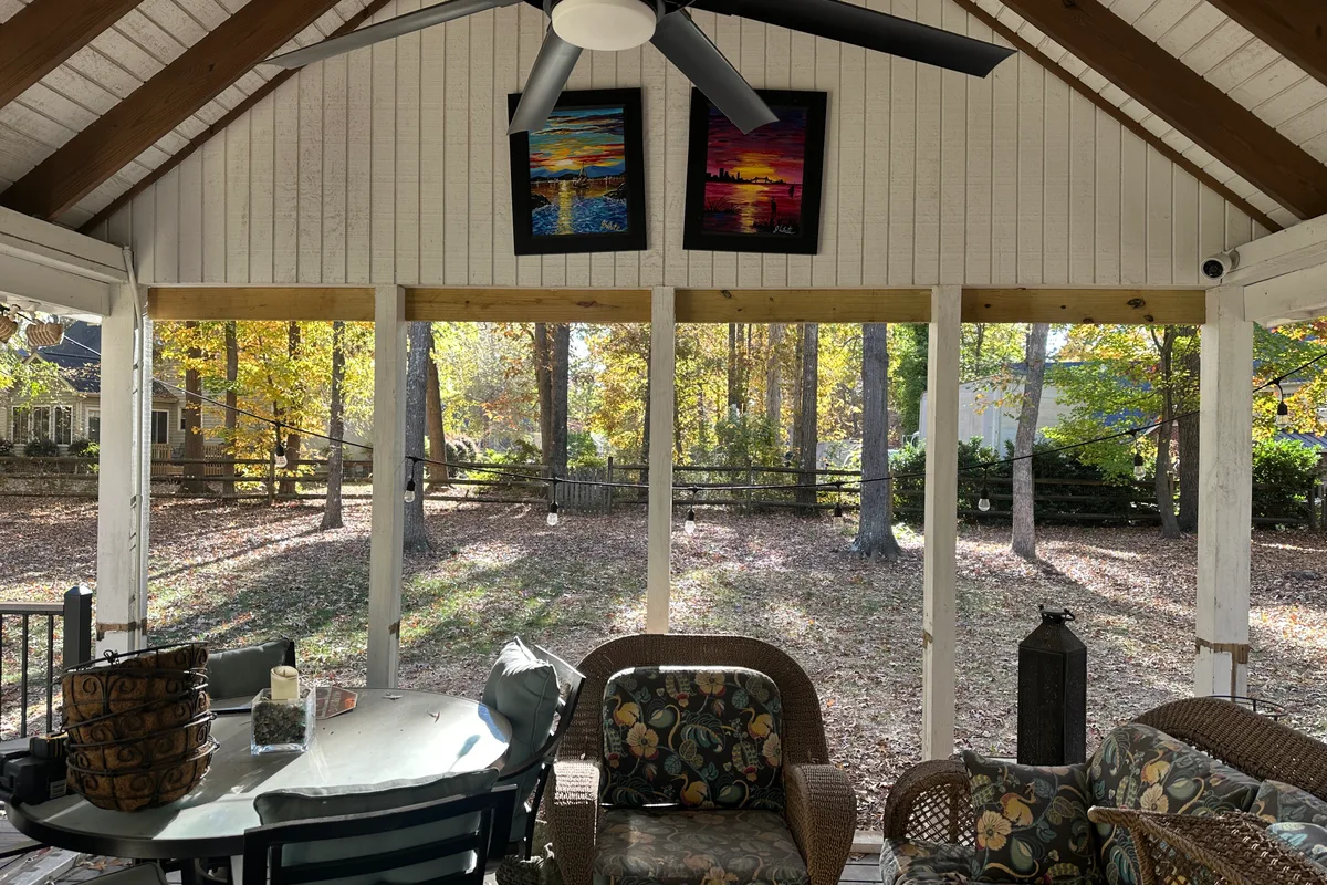 Open porch before 3-season room enclosure project Monroe North Carolina
