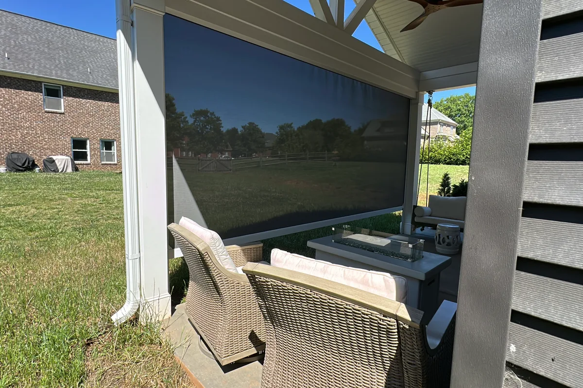 Retractable sunroom screens installation detail in Mint Hill NC outdoor enclosure