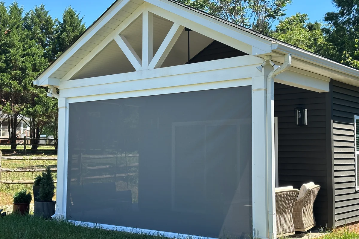 Completed retractable screen enclosure exterior view in Mint Hill Charlotte NC